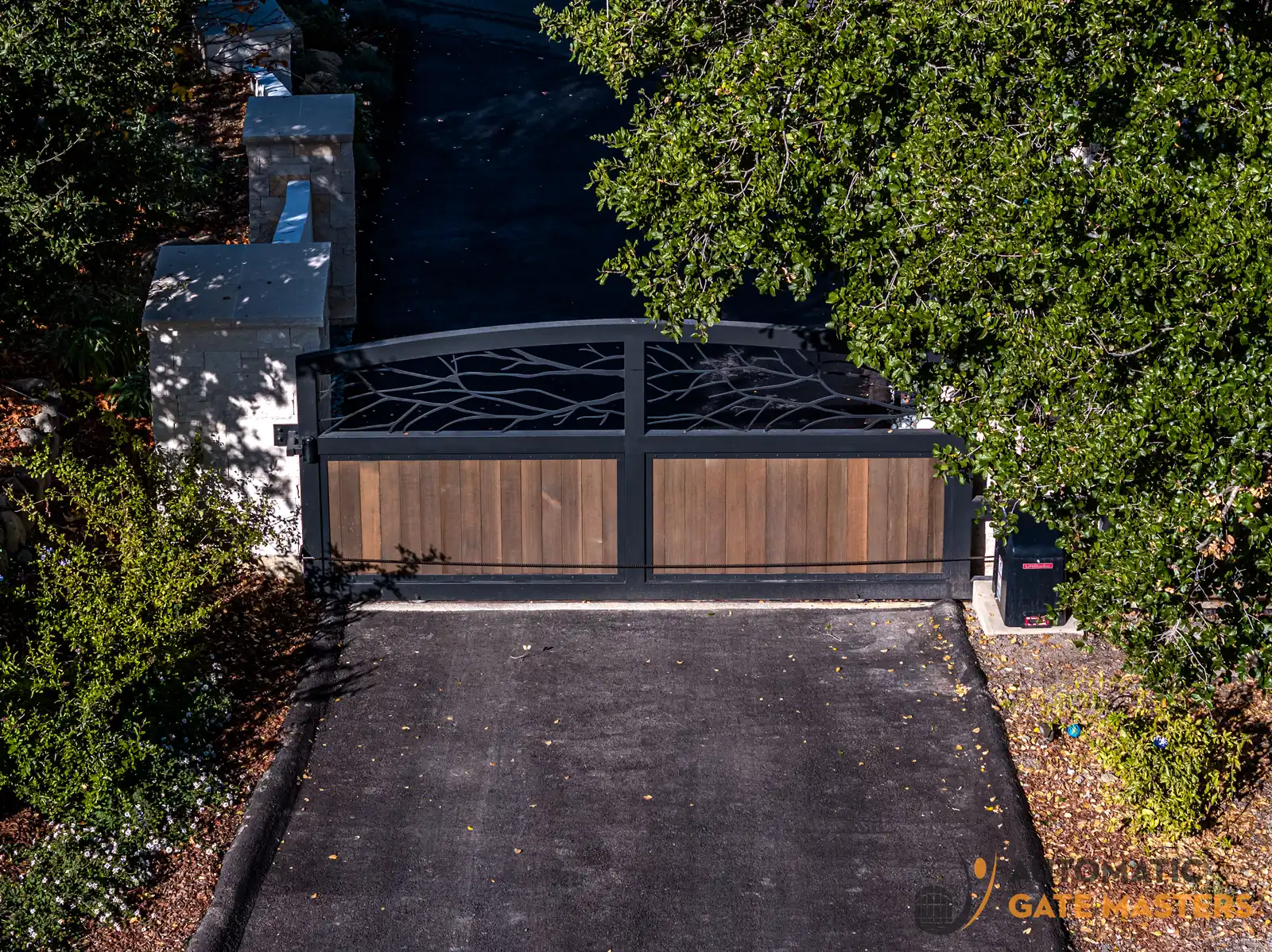 Laser-cut steel panel driveway gate idea in Los Altos Hills