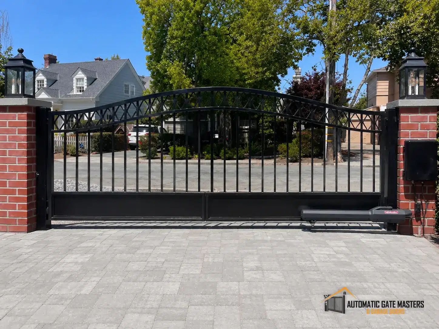 15-foot custom steel single swing driveway gate with a LiftMaster LA500 operator, installed in Burlingame, CA