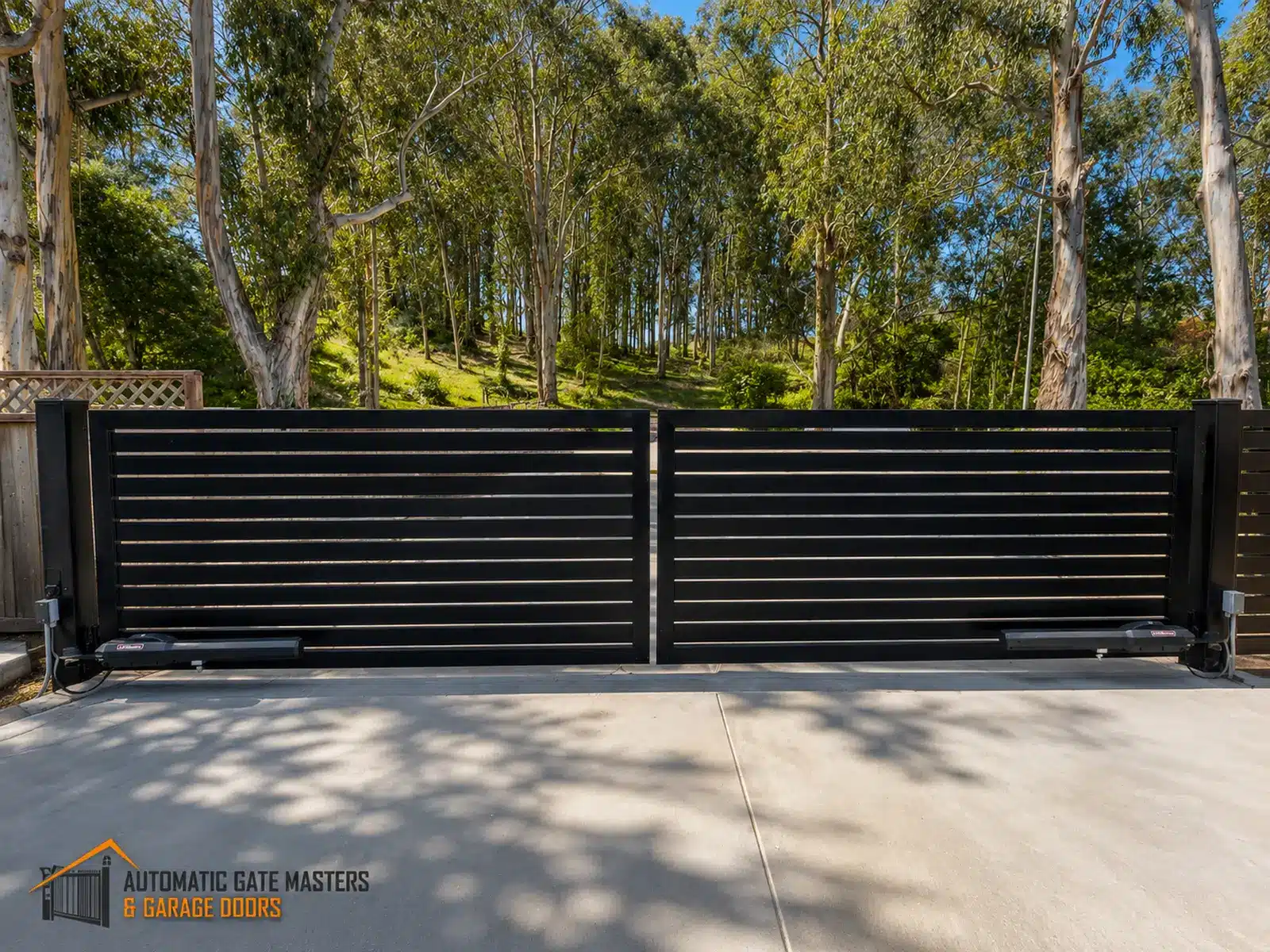 Black horizontal slat dual swing driveway gate idea in Burlingame